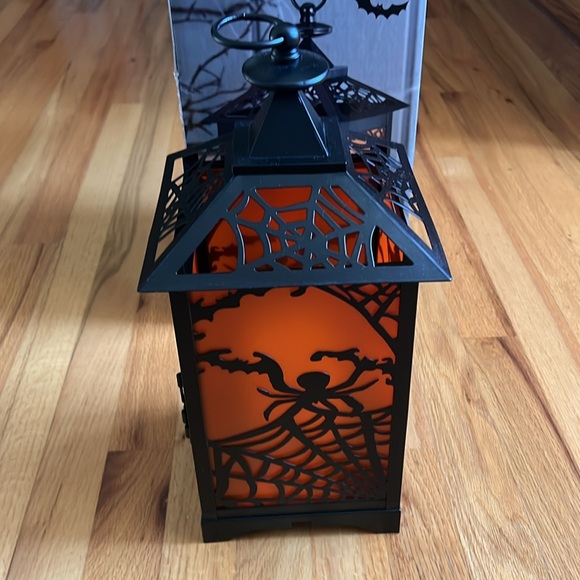 Halloween Lantern - 7.1”Lx7.1”Wx15.2”H. Includes LED candle with auto timer. - Picture 3 of 9